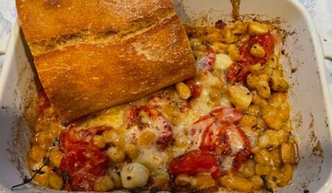 Baked tomatoes, garlic and beans served with crusty bread.